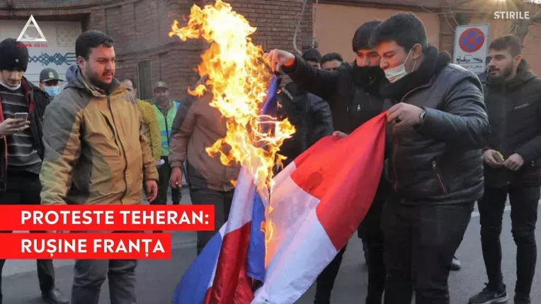 Protestatarii iranieni au ars drapelul Frantei in fata Ambasadei franceze de la Teheran